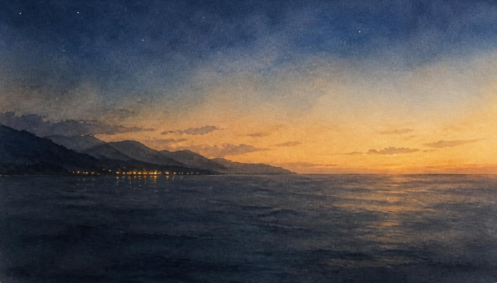 Distant coastal lights across a calm evening sea